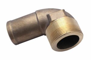 A close up of the end of a brass pipe